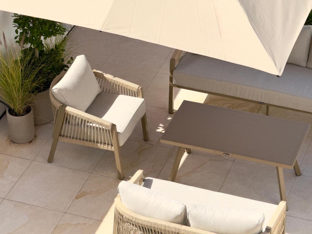 Outdoor 5 and 7 seater rope sofa set with aluminium frame and waterproof cushions, perfect for patio or garden seating.
