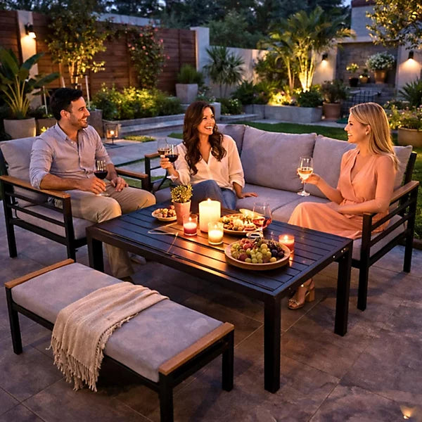 Black 6-seater outdoor aluminum sofa set with waterproof cushions, stylish garden furniture from The Outdoor Furniture Market.