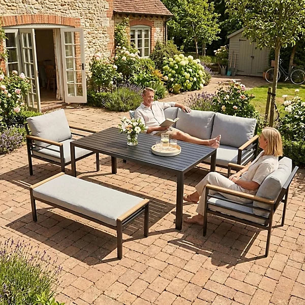 Black aluminum outdoor sofa set with waterproof cushions, 6-seater garden furniture from The Outdoor Furniture Market.
