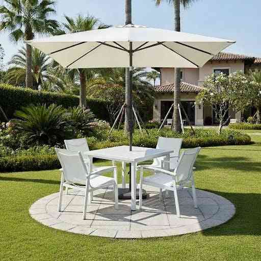 Contemporary white aluminum outdoor dining set with four chairs and table, modern design for patio or garden use.