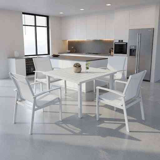 Contemporary white aluminum outdoor dining set with four chairs and table, ideal for patio or garden dining spaces.