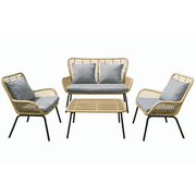 Elegant rattan outdoor sofa set with plush cushions, featuring a stylish design suitable for patio or garden seating.