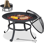 Round Casa Fiora outdoor fire pit BBQ grill, 76cm, set up in a garden patio, showcasing the cooking station design.