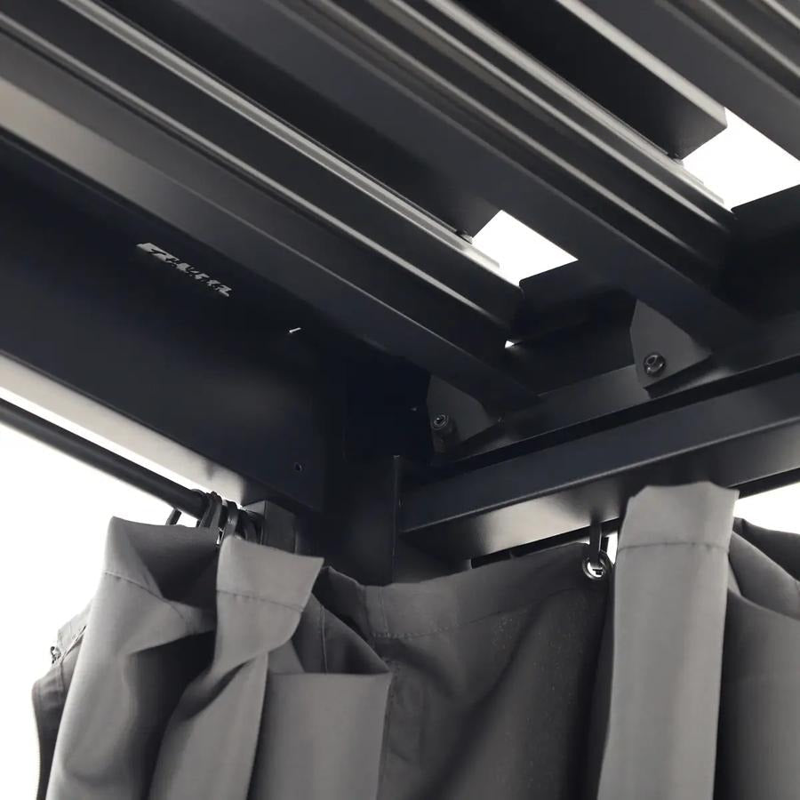 Black metal pergola structure with grey outdoor curtains at The Outdoor Furniture Market