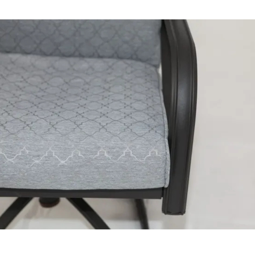 Casa Fiora modern gray swivel rocker dining chair with a metal steel frame and cushioned seat, shown from the side.