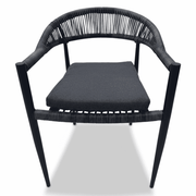 Modern outdoor rope dining chair with aluminum frame and weather-resistant cushion, part of a dining set by The Outdoor Furniture Market.