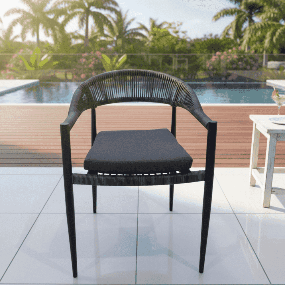 Modern outdoor rope dining chair with aluminum frame and weather-resistant cushion, ideal for stylish patio dining setups.