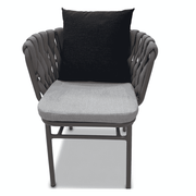 Modern outdoor rope-weave dining chair with aluminum frame and weatherproof cushions, perfect for stylish patio seating.