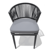 Modern rope outdoor dining chair with aluminum frame and weather-resistant cushion, part of a stylish dining set.
