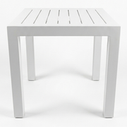 Modern white slatted outdoor side table from The Outdoor Furniture Market