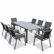 Outdoor dining set by The Outdoor Furniture Market with a table and chairs featuring wood-look armrests and durable outdoor materials.