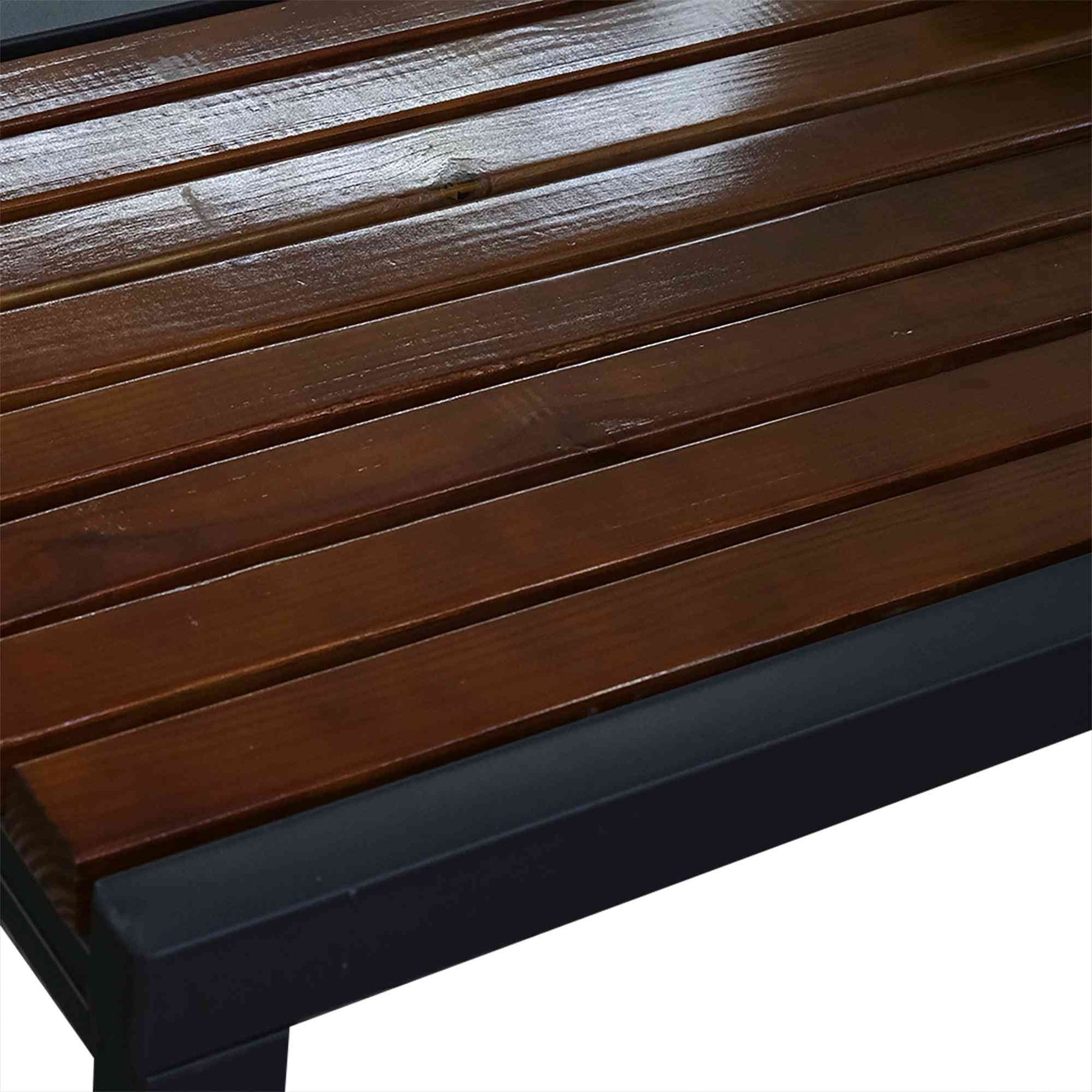 Outdoor picnic table set featuring wooden slats and a sturdy metal frame by .