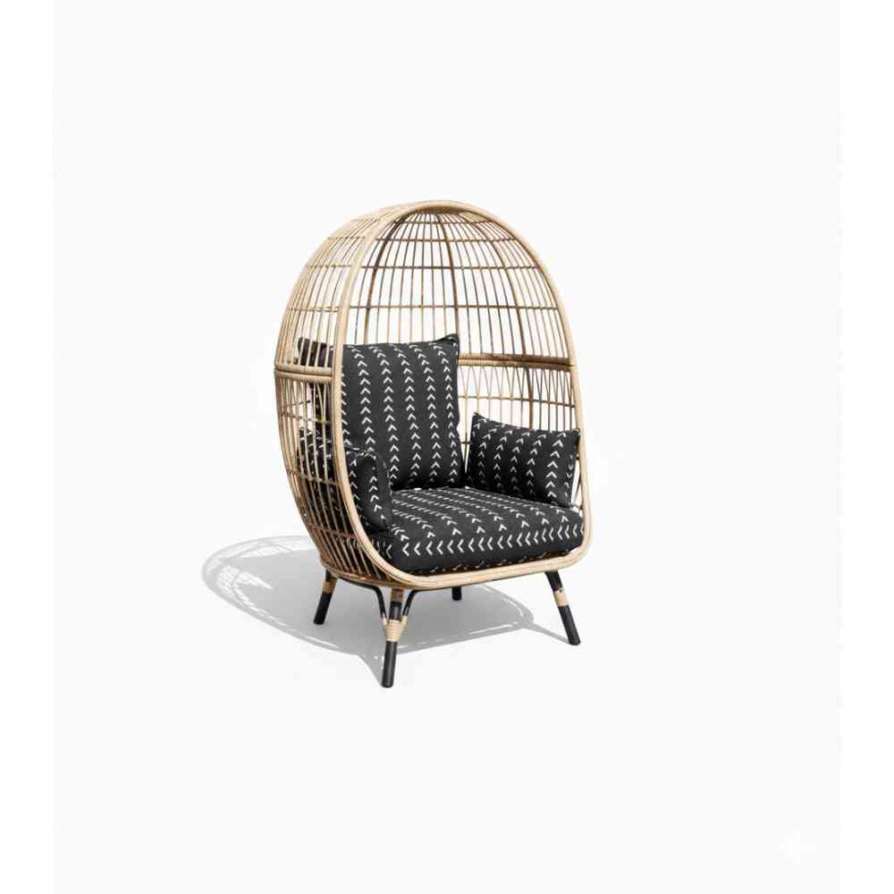 Oversize wicker egg chair by The Outdoor Furniture Market with a rounded, cozy design and woven wicker texture.