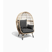Oversize wicker egg chair by The Outdoor Furniture Market with a rounded, cozy design and woven wicker texture.