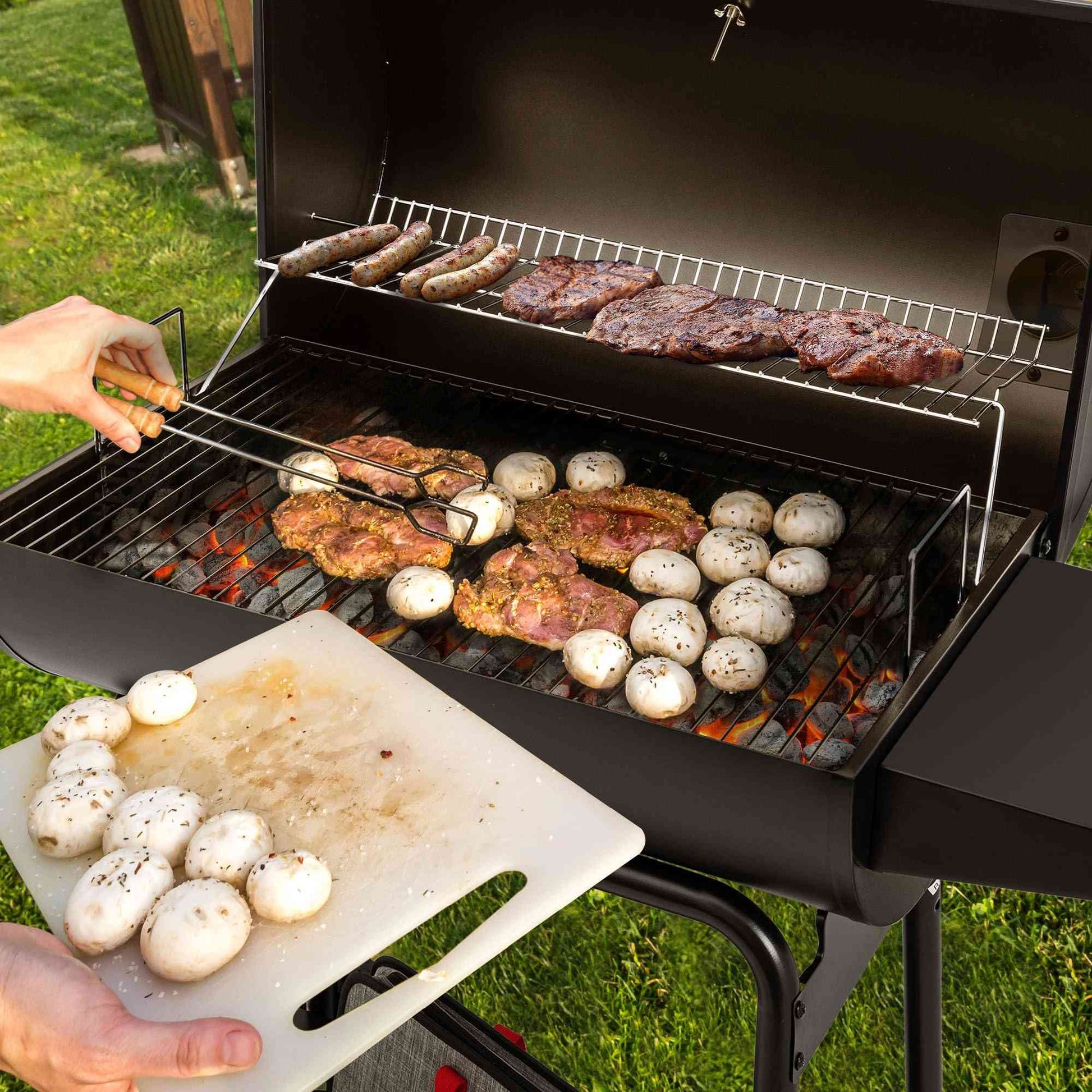 Royal Gourmet CC1830 30-inch barrel charcoal grill with 627 sq.in cooking space, outdoor charcoal grill in black with lid and vents.