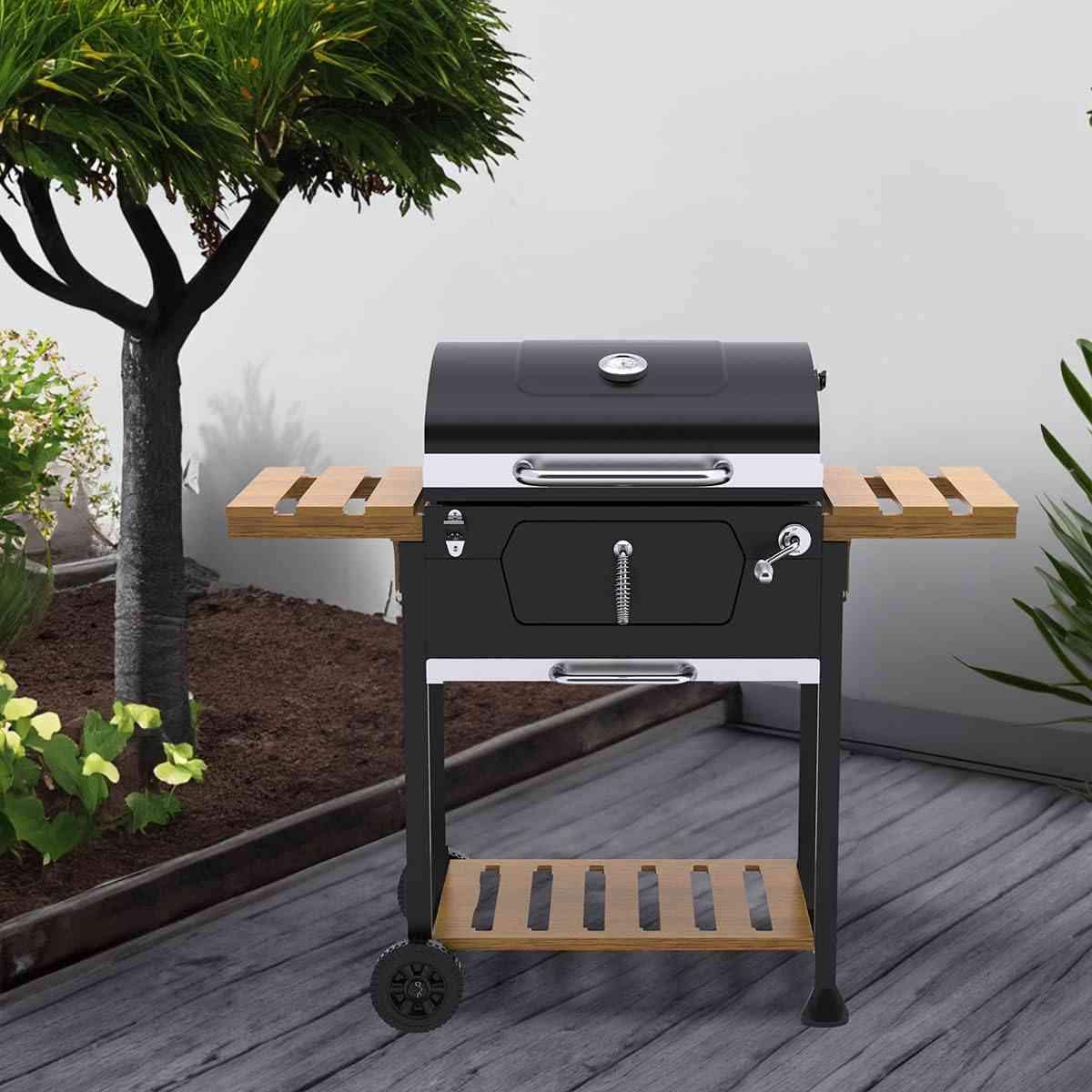 Royal Gourmet CD1824M 24-inch charcoal outdoor grill with folding side trays and cooking grate, suited for outdoor barbecues.