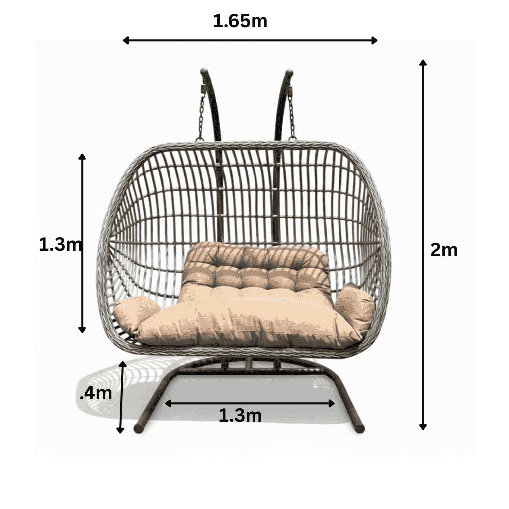 Two-person outdoor patio swing chair with rattan frame and plush cushions, perfect for relaxing in a garden or patio setting.
