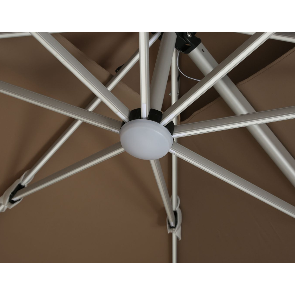 CasaFiora khaki cantilever outdoor umbrella with solar LED lights and water base, providing shade for patios and gardens.