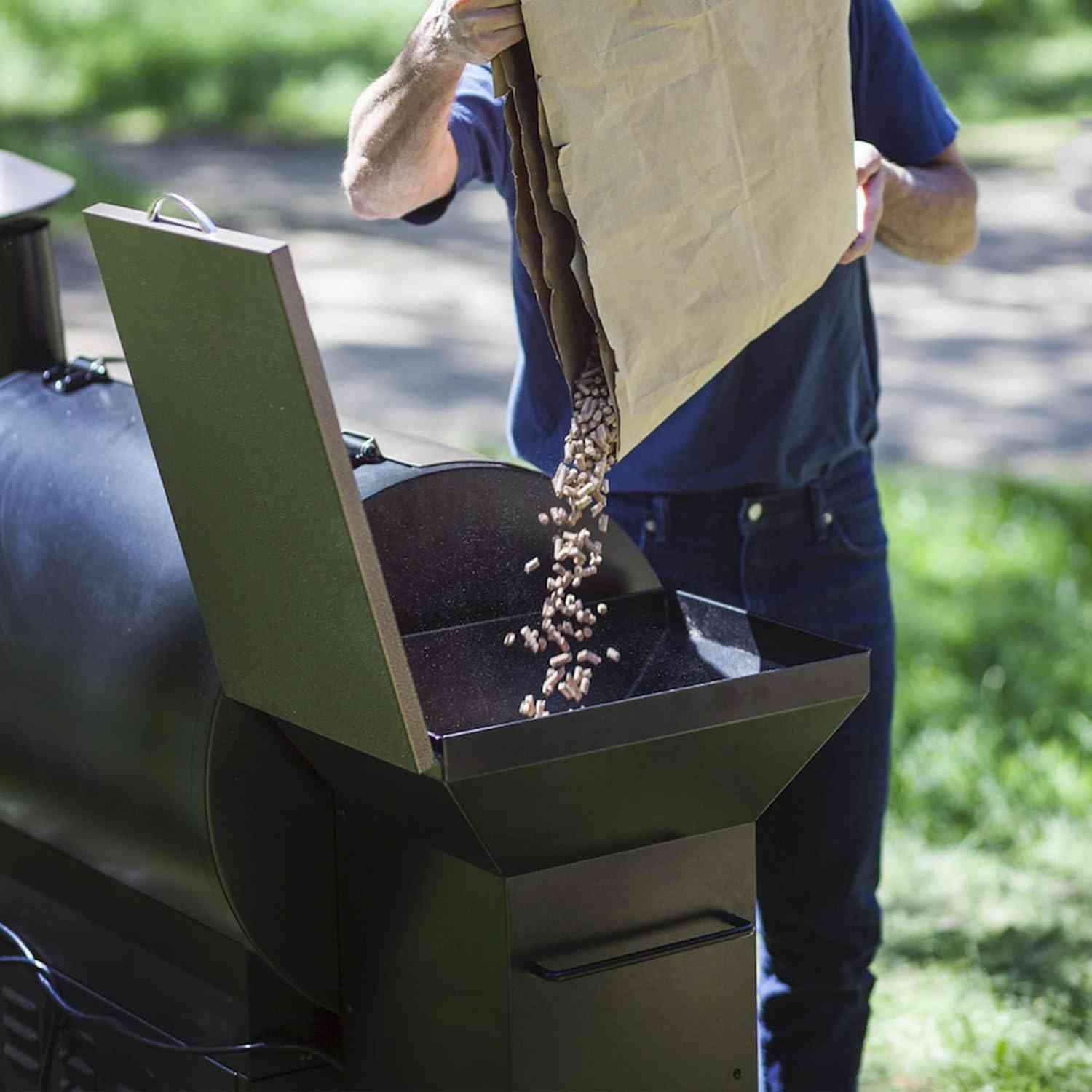 Z GRILLS 8-in-1 wood pellet outdoor grill and smoker with auto temperature control, showing the sleek black grill with digital controls