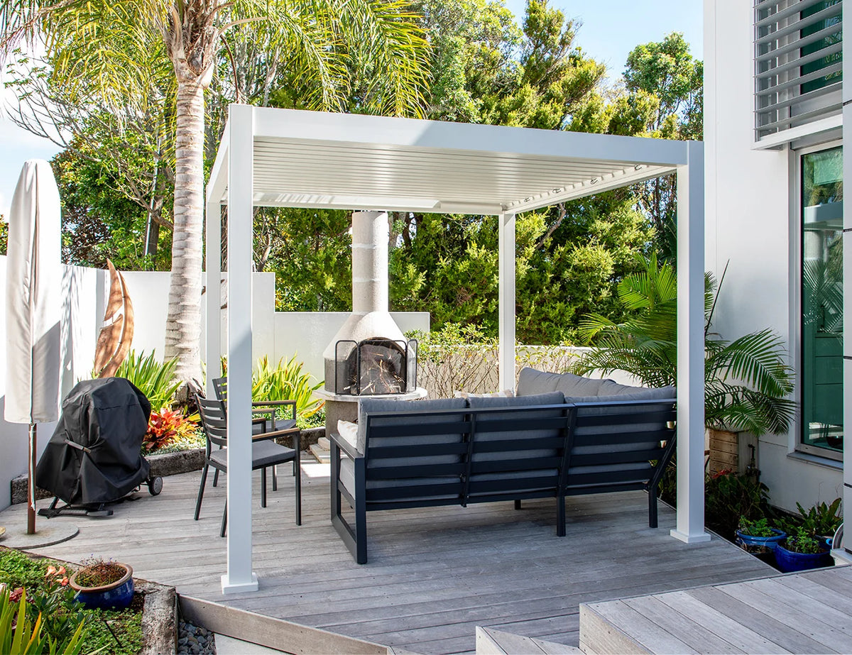 Luxury 3x4m aluminium gazebo with wind-resistant roller blinds, freestanding pergola designed for outdoor shading and style.