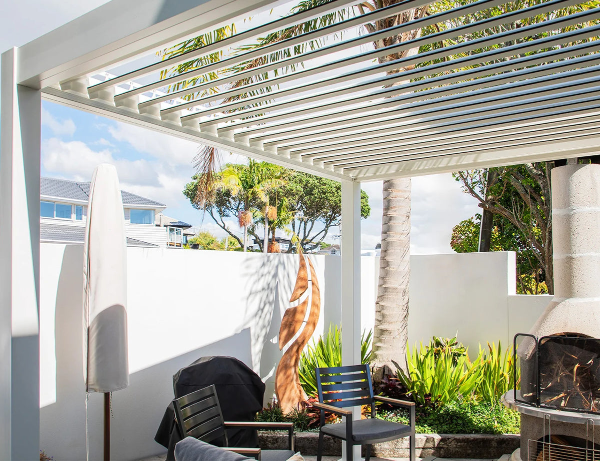 Luxury 3×4m aluminium gazebo with wind-resistant roller blinds, featuring adjustable louvers for outdoor shade and shelter.